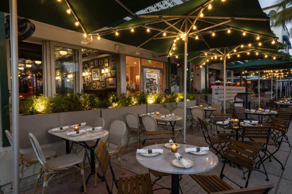 News Café outdoor tables at night
