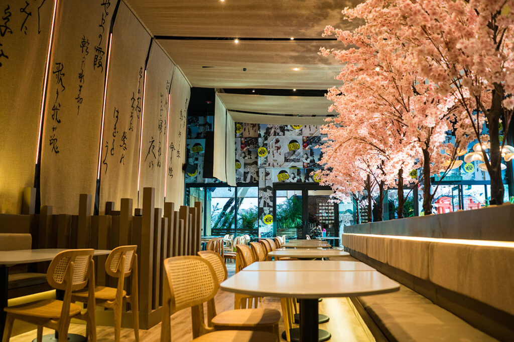 Paperfish Sushi salon with contemporary  interior design  with Japanese accents by Mico Design Studio. Light wood furniture and fabrics on ceilings and walls. 
